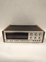 Front view of the Kenwood KR-8040 receiver showing metal front panel and wood sides