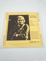 Front cover of vinyl record 'Van The Man' by Van Morrison showing a photo of the artist with guitar and track listing.