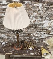 Photo of both the Mid-Century Gothic Revival style lamp and the accordion wall light with scissor arm spread out, showing the lampshade, base and metal components.
