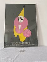 Front view of the framed clown print showing central artwork and signature.