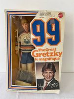 Front view of the boxed Wayne Gretzky figure showing packaging and figure.