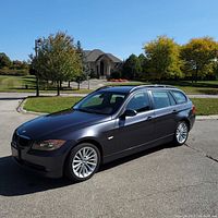 Front-left three-quarter view showing exterior paint, headlights and alloy wheels
