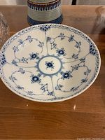 Top-down view of dish showing fluted ribs and blue floral pattern