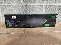 Box front showing product image, size as 360 x 275 mm and Razer Gigantos V2 branding