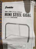 Instruction manual with specifications and illustration of Franklin Sports mini steel goal.