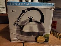 Boxed Panorama 3.7 quart stainless steel whistling tea kettle showing overall condition and packaging.