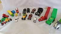 Overview of all collectible vintage toy vehicles from construction equipment to antique cars and semi trucks.