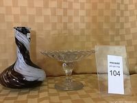 Both items shown side by side from front view on patterned surface