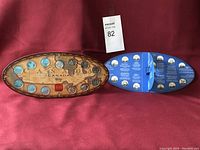 Two Canadian Millennium quarter sets from 1999 and 2000, each in original oval presentation cases opened to show 13 quarters with descriptions on reverse sides