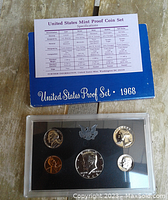 1968 United States Proof Coin Set in hard plastic case with original informational insert showing specifications and mint details.