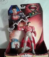 Front view of the Superman Power Attack figurine in its display packaging showing the figure and background art.