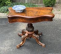Table top view with footed porcelain dish on top