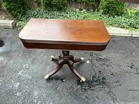 Table top closed showing mahogany finish and edge detailing
