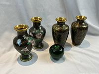 Photo of two pairs of Chinese Export cloisonné vases with green glass apple for size reference