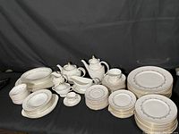 Full set arranged on black cloth backdrop