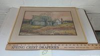 Framed watercolor painting showing a rural farm scene with a barn and tree, including a ruler for scale measuring about 21.5 x 15.5 inches.