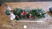 Full lot showing the metal reindeer plant holder and the Christmas greenery and candle holder centerpiece