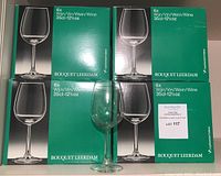 Four original green boxes each labeled with 6 wine glasses 35cl(12.5oz) Bouquet Leerdam, set of 24 wine glasses visible in front of boxes.