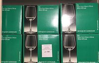 Four original green boxes with six wine glasses each shown stacked, labelled Bouquet Leerdam, 35cl-12.5oz each.
