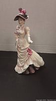 Front view of the Royal Doulton HN 3471 British Sporting Heritage figurine showing detailed gown and hat.