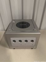 Front view showing the four controller ports and two memory card slots.