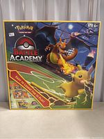 Front view of sealed Pokemon Battle Academy game box with Charizard and Pikachu artwork