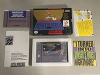 Full set of Prince of Persia SNES game: cartridge, box, manual, booklet, and yellow promotional insert.