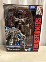 Front view of Transformers Sideswipe action figure in original box with Takara Tomy and Hasbro branding, Studio Series number 78