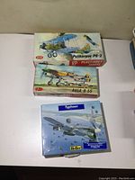 Photo of three model plane kits in boxes: Polikarpov PO-2, Avia B.35 and Typhoon