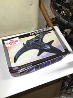 Front view of the original box showing the F-19 Stealth Fighter model kit and artwork.