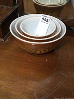 Set of three nested Pyrex mixing bowls shown from the top and side.