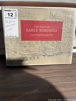 Front cover of the book 'The Face of Early Toronto' showing title, author, and a vintage map design.