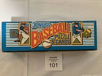 Top view of the box showing the Donruss Baseball Puzzle & Cards branding and illustration of baseball players pitching and batting.