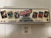 Top and side views of the original 1991 Edition 3-D Team Hologram and Baseball Card Set box showing branding, player images, and set details.