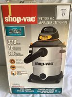 Box of Shop Vac wet/dry vacuum showing brand, specifications: 37.8 litres, 10 US gallons, 5.5 peak HP, SXV2 motor technology, longer motor life