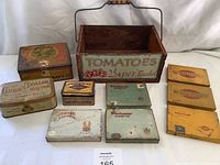 Overview of all wooden crate and 10 assorted vintage tins showing condition and variety