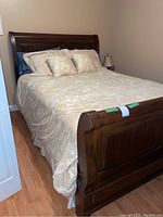 Front view of assembled bed with bedding