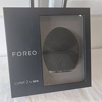 Front of box showing Foreo Luna 2 for Men with visible brush window.
