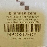 Label showing product details including brand website, model number, and specification for Matte Black Front Kidney Grille Pair for BMW F30.
