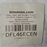 Label from bimmian.com showing product details: Depo clear and smoked front T for BMW 3 Series Coupe or Convertible, smoke lenses, euro style black housing without light bulbs
