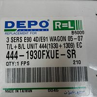 Close up of DEPO label showing part number 444-1930FXUE-SR for right/left units compatible with BMW 3 Series E90 4-door/E91 Wagon 2005-2007 models.