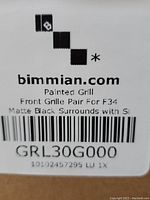 Label on the box showing brand bimmian.com, product description as Painted Grill Front Grille Pair for F34 Matte Black Surrounds with SI, model number GRL30G000.