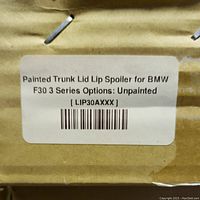 Label on box indicating Painted Trunk Lid Lip Spoiler for BMW F30 3 Series, unpainted option