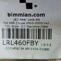 Label on packaging showing brand, product name, compatibility (E46 Coupe 2000-2003) and style (F30 style LED blackline clear).