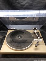 Overall view of Technics SL-20 turntable with dust cover open showing platter and tonearm.