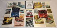 Top view image showing all Pontiac advertisements and brochures laid out, five brochures in front with GTO, LeMans and Tempest titles visible, other ads stacked behind them, all bagged and boarded
