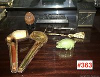 Overall view of six lot items displayed together on table