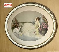 Full view of framed Art Deco style drypoint etching 'Le Repose' showing reclining woman with dog and floral background in round frame.