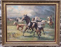 Full view of the antique oil painting showing running horses and a horseman in a field with frame included.