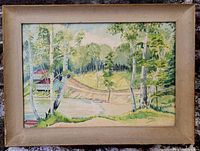 Watercolor painting with trees and river in natural landscape, framed, showing overall artwork and signature.